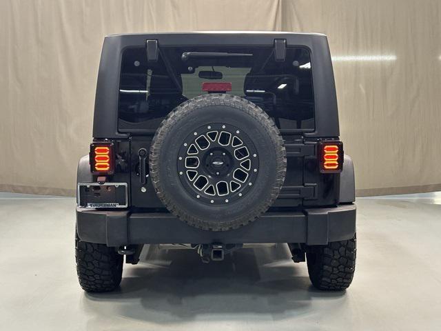 used 2014 Jeep Wrangler Unlimited car, priced at $14,550