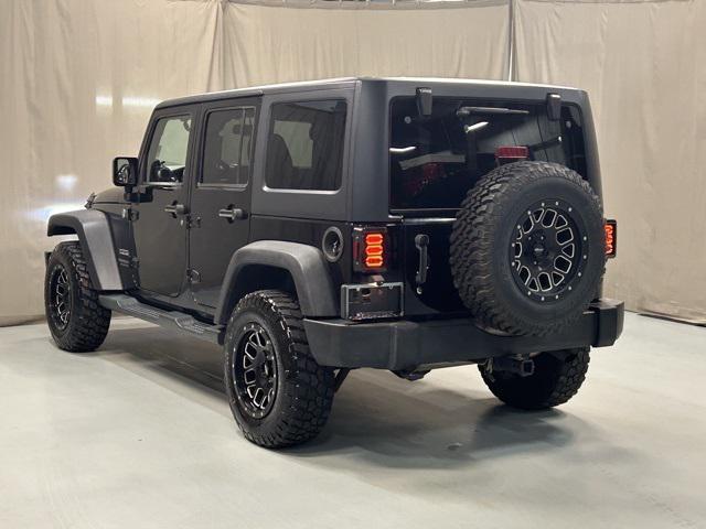 used 2014 Jeep Wrangler Unlimited car, priced at $14,550