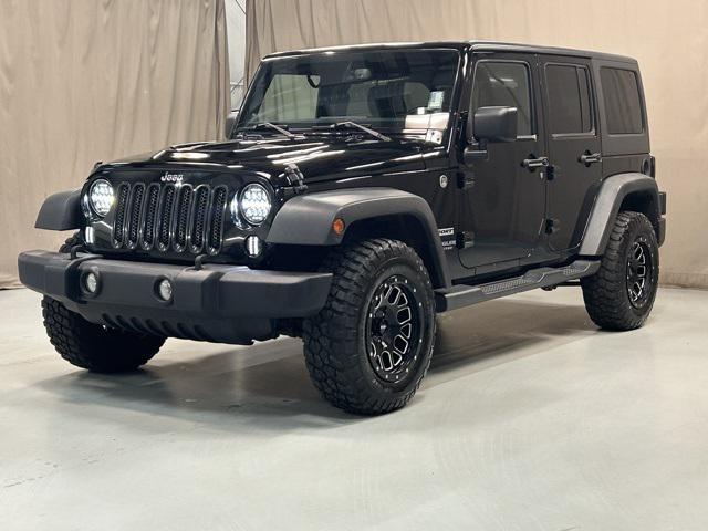 used 2014 Jeep Wrangler Unlimited car, priced at $14,550