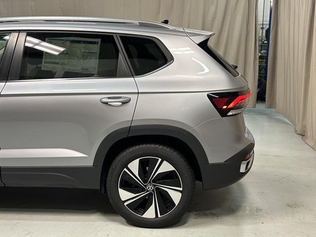 new 2025 Volkswagen Taos car, priced at $33,216