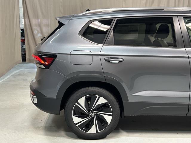 used 2025 Volkswagen Taos car, priced at $26,050