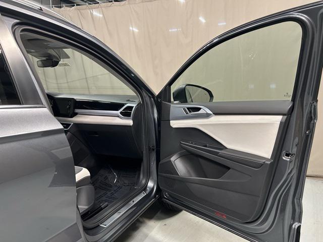 used 2025 Volkswagen Taos car, priced at $26,050