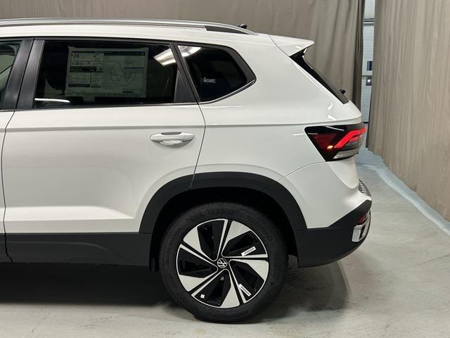 new 2025 Volkswagen Taos car, priced at $32,014