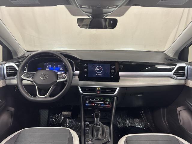 new 2025 Volkswagen Taos car, priced at $32,806