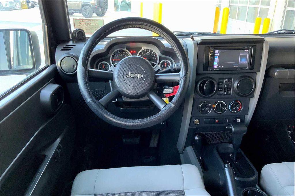 used 2010 Jeep Wrangler Unlimited car, priced at $13,592