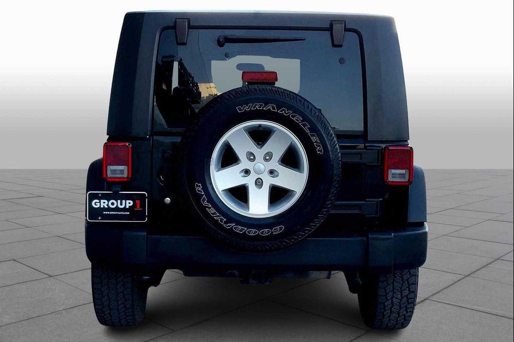 used 2010 Jeep Wrangler Unlimited car, priced at $13,592
