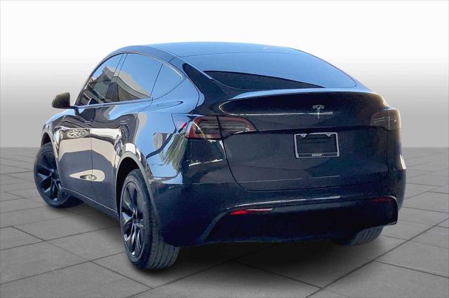 used 2024 Tesla Model Y car, priced at $33,842