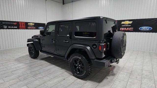 used 2023 Jeep Wrangler car, priced at $34,999