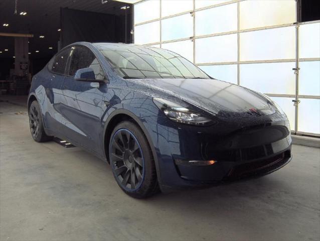 used 2024 Tesla Model Y car, priced at $32,999