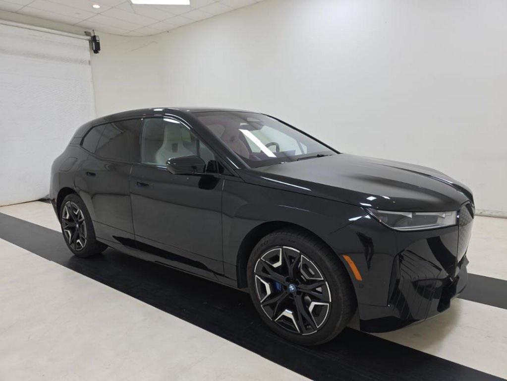 used 2024 BMW iX car, priced at $53,599