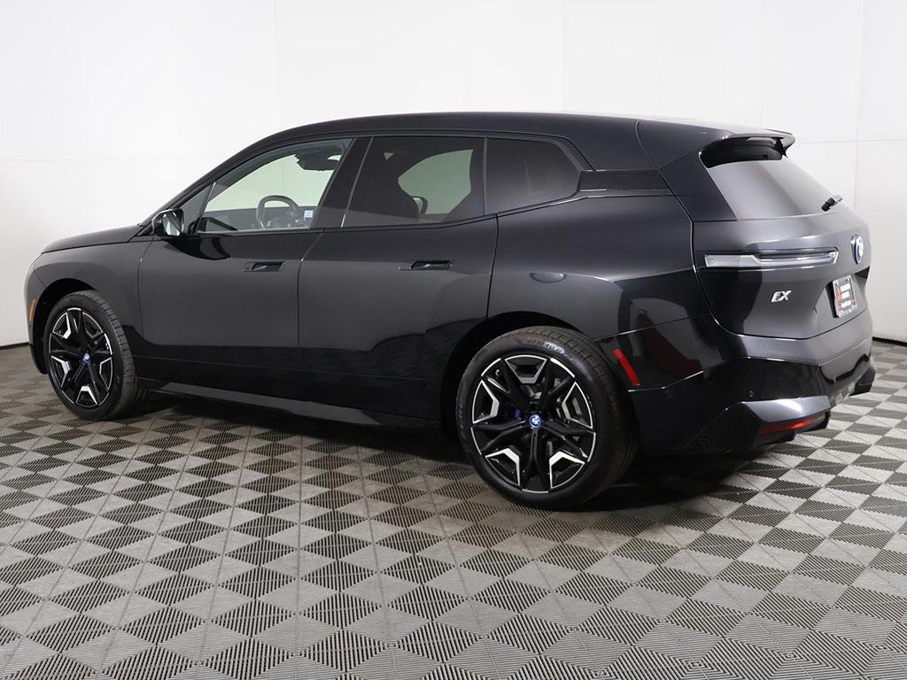 used 2024 BMW iX car, priced at $49,199