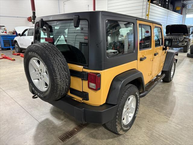 used 2013 Jeep Wrangler Unlimited car, priced at $17,224