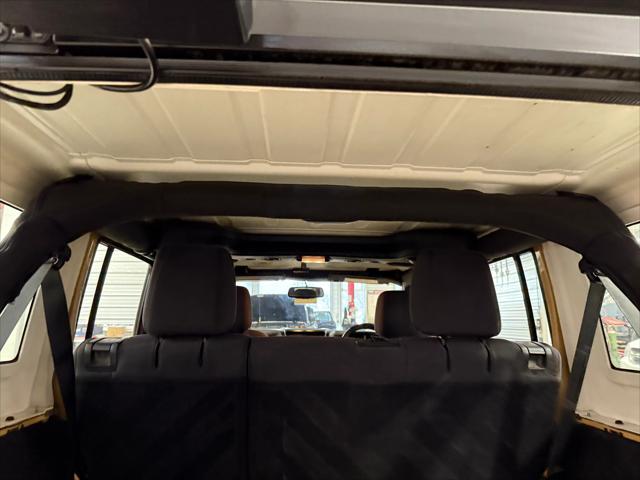 used 2013 Jeep Wrangler Unlimited car, priced at $17,224
