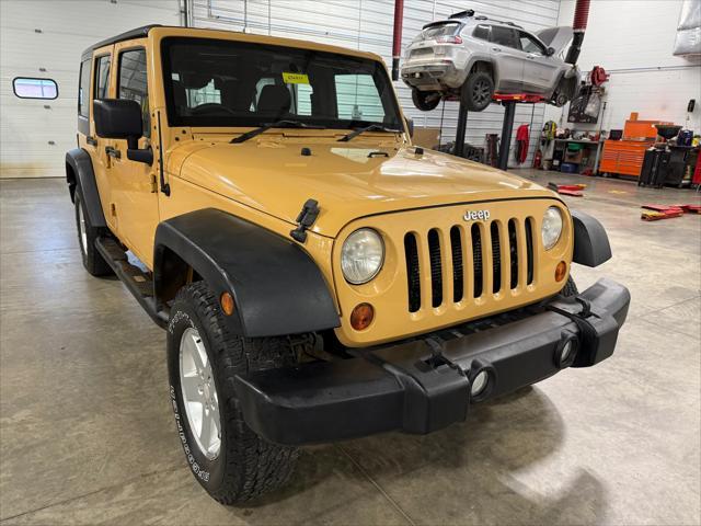 used 2013 Jeep Wrangler Unlimited car, priced at $17,224