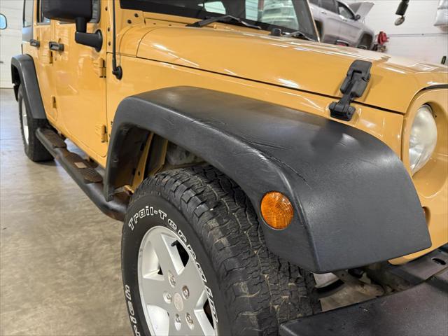 used 2013 Jeep Wrangler Unlimited car, priced at $17,224