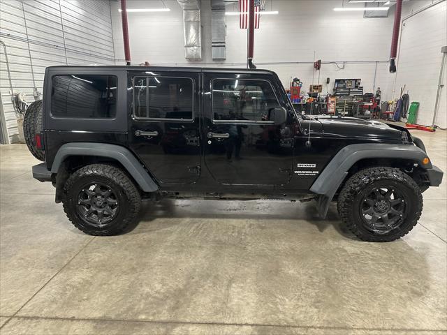 used 2015 Jeep Wrangler Unlimited car, priced at $21,907