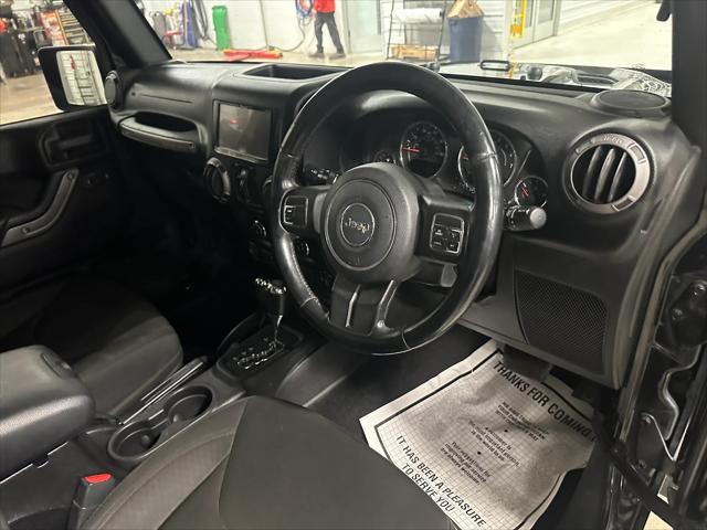 used 2015 Jeep Wrangler Unlimited car, priced at $21,907