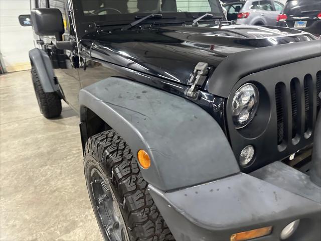 used 2015 Jeep Wrangler Unlimited car, priced at $21,907