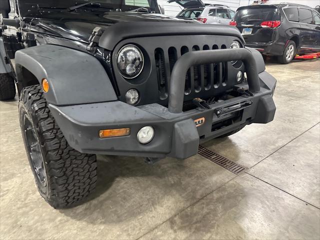 used 2015 Jeep Wrangler Unlimited car, priced at $21,907