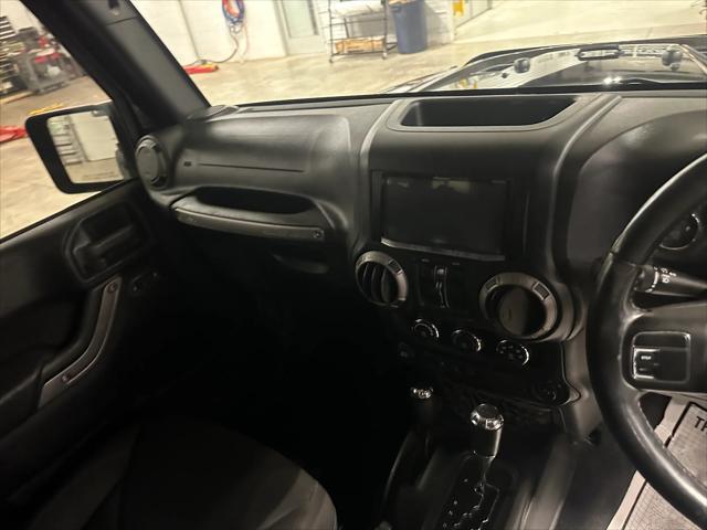 used 2015 Jeep Wrangler Unlimited car, priced at $21,907