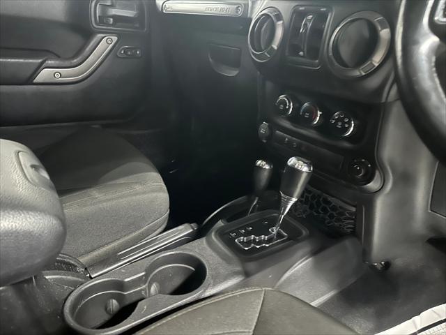 used 2015 Jeep Wrangler Unlimited car, priced at $21,907