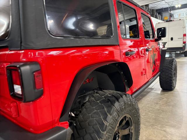 used 2021 Jeep Wrangler Unlimited car, priced at $27,559