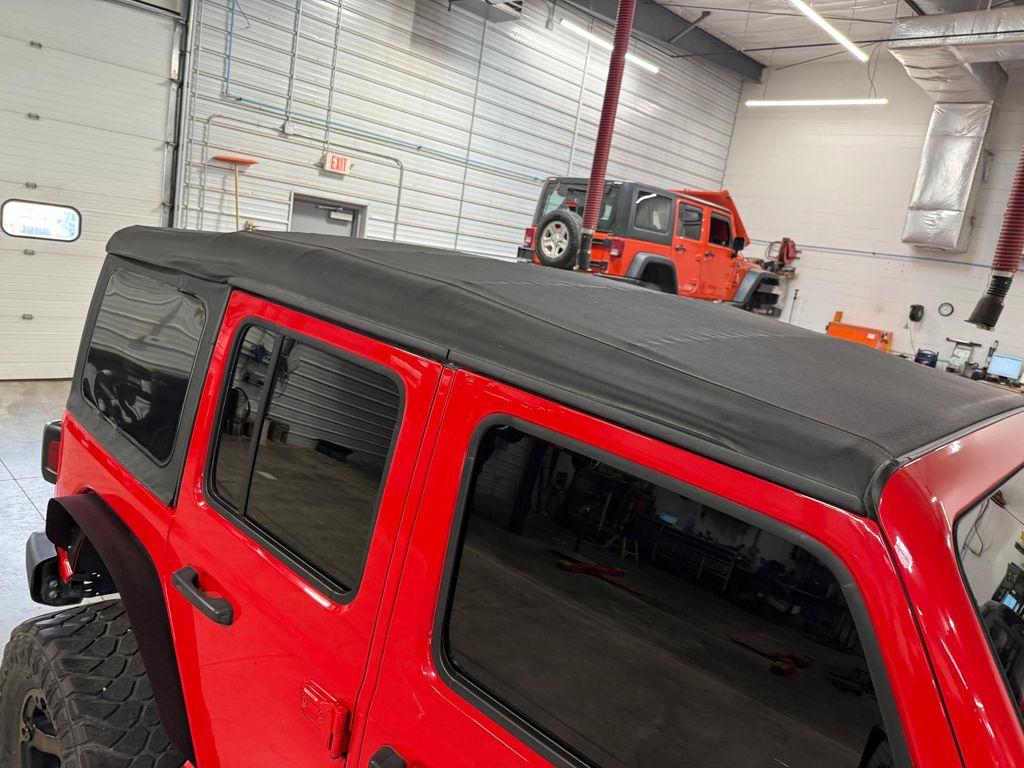 used 2021 Jeep Wrangler Unlimited car, priced at $25,339