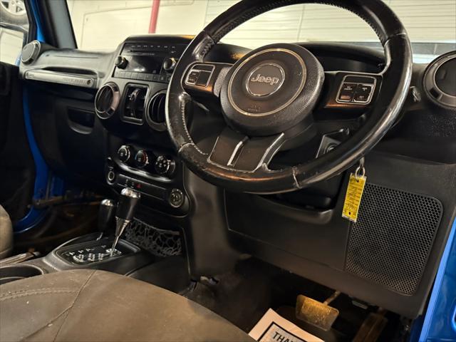 used 2015 Jeep Wrangler Unlimited car, priced at $16,881