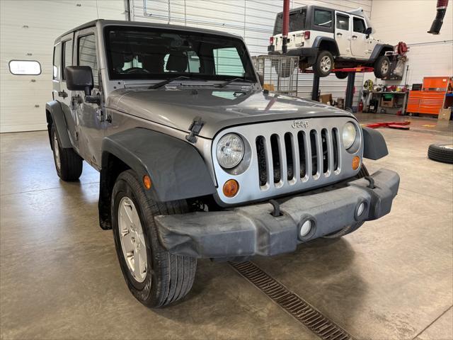 used 2013 Jeep Wrangler Unlimited car, priced at $7,995