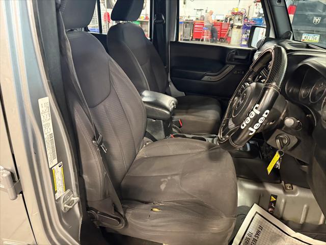 used 2013 Jeep Wrangler Unlimited car, priced at $7,995