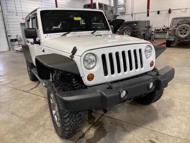used 2013 Jeep Wrangler Unlimited car, priced at $19,467