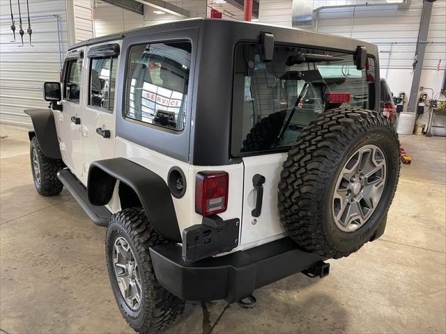 used 2013 Jeep Wrangler Unlimited car, priced at $19,467