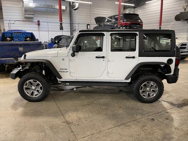used 2013 Jeep Wrangler Unlimited car, priced at $19,467