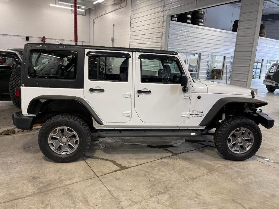 used 2013 Jeep Wrangler Unlimited car, priced at $21,447