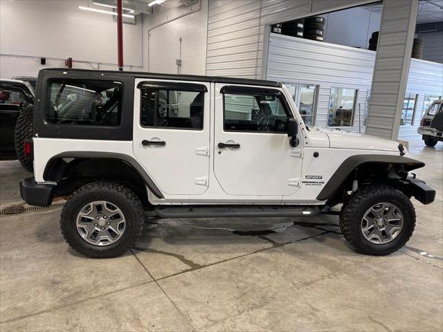 used 2013 Jeep Wrangler Unlimited car, priced at $19,467