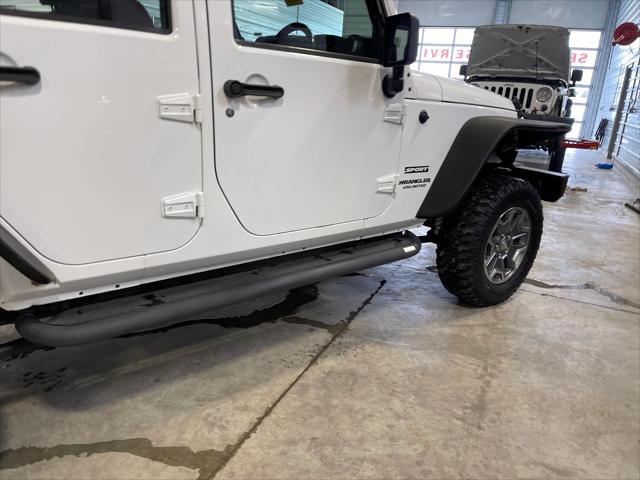 used 2013 Jeep Wrangler Unlimited car, priced at $19,467