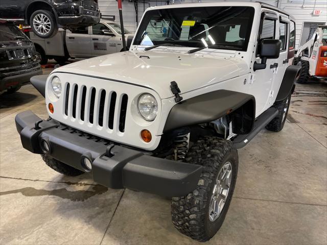 used 2013 Jeep Wrangler Unlimited car, priced at $19,467
