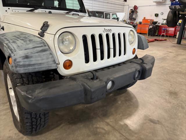 used 2009 Jeep Wrangler Unlimited car, priced at $13,998
