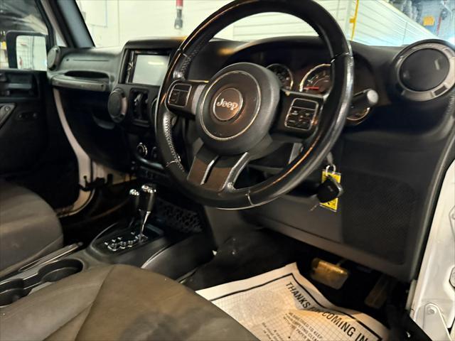 used 2016 Jeep Wrangler Unlimited car, priced at $20,911