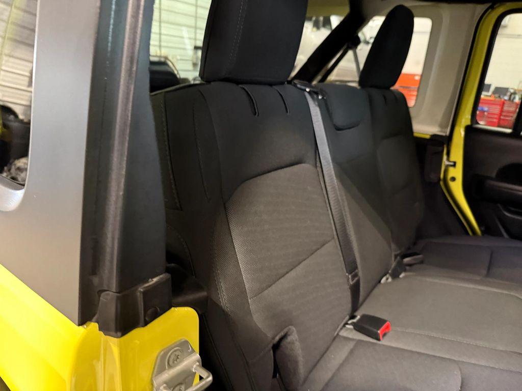 used 2023 Jeep Wrangler car, priced at $33,388