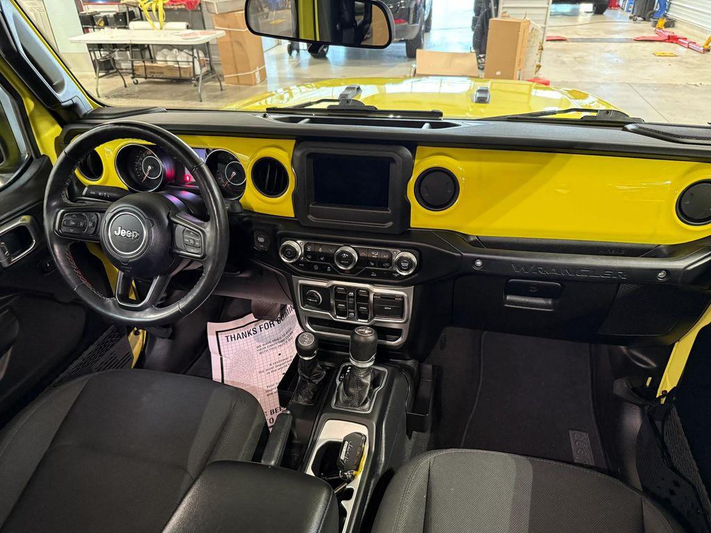 used 2023 Jeep Wrangler car, priced at $33,388