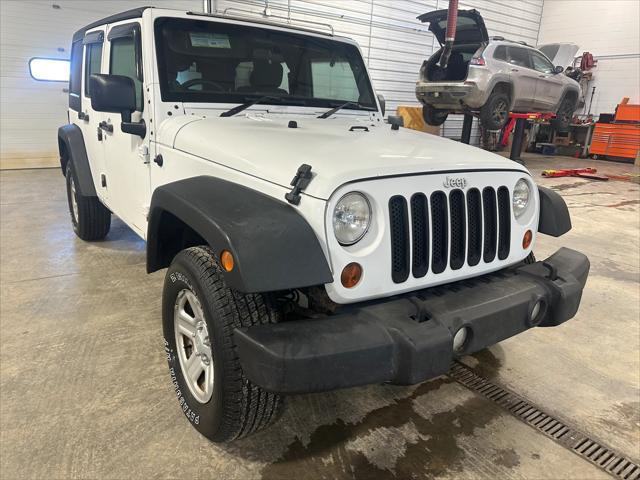 used 2012 Jeep Wrangler Unlimited car, priced at $13,999