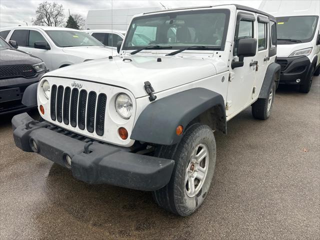 used 2012 Jeep Wrangler Unlimited car, priced at $13,999