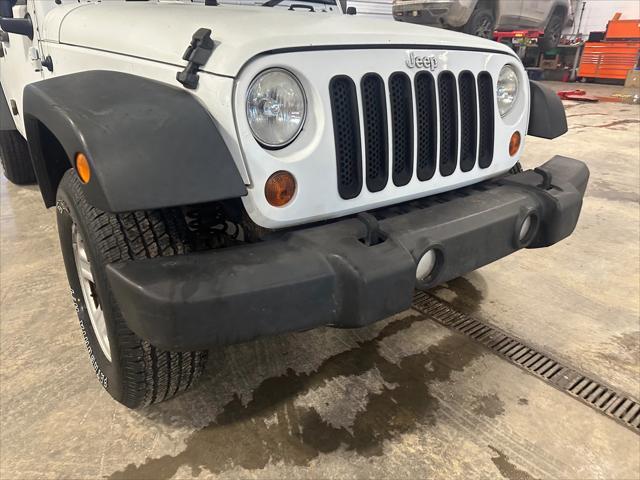 used 2012 Jeep Wrangler Unlimited car, priced at $13,999