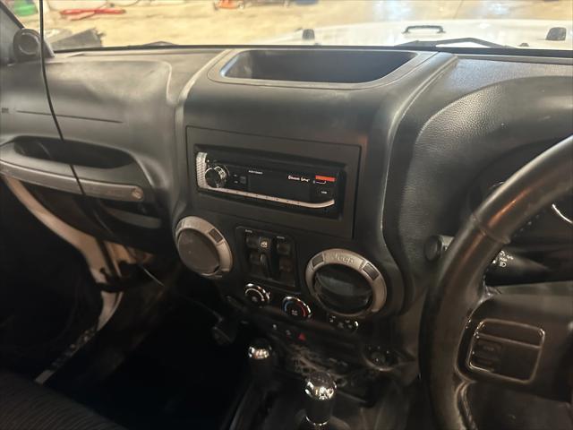 used 2012 Jeep Wrangler Unlimited car, priced at $13,999