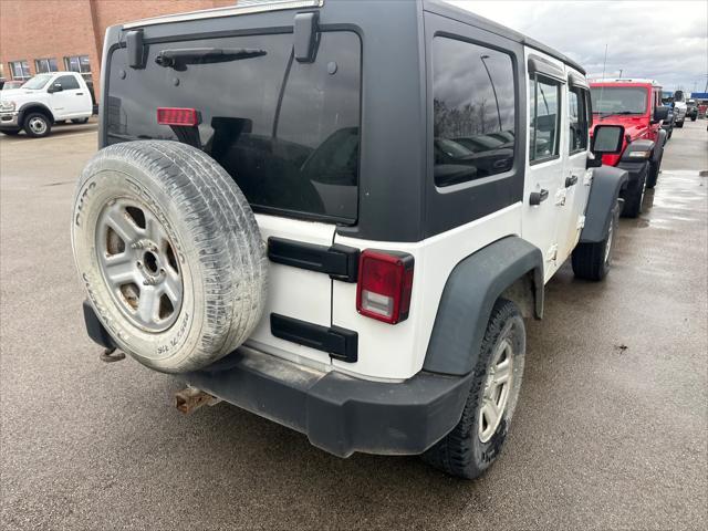 used 2012 Jeep Wrangler Unlimited car, priced at $13,999