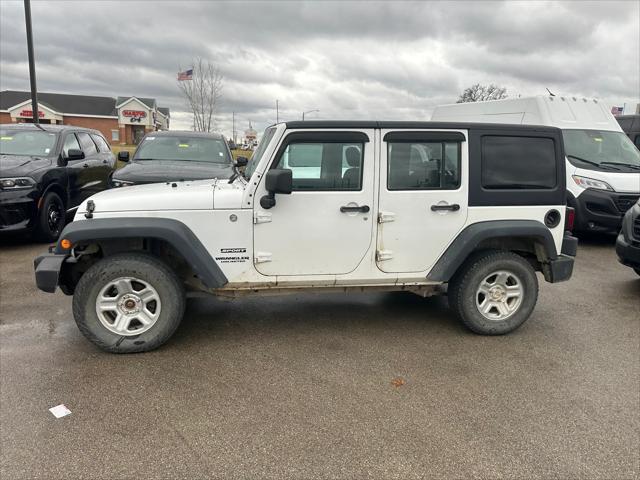 used 2012 Jeep Wrangler Unlimited car, priced at $13,999