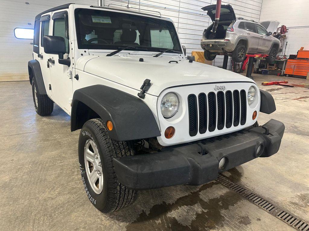 used 2012 Jeep Wrangler Unlimited car, priced at $13,339