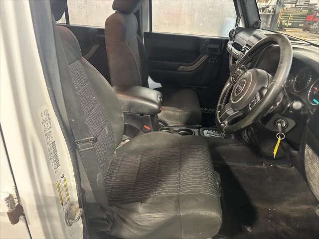 used 2012 Jeep Wrangler Unlimited car, priced at $13,999