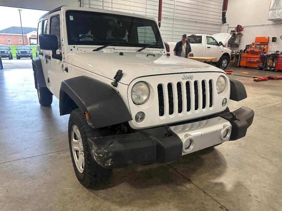 used 2014 Jeep Wrangler Unlimited car, priced at $14,583
